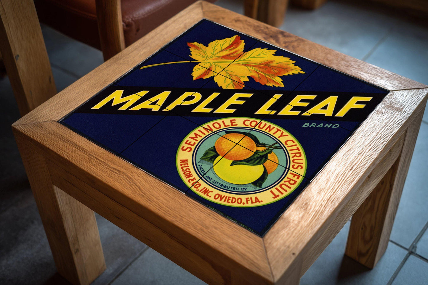 Tile mural with maple and citrus leaves – Vintage Florida fruit crate label – Retro American kitchen decor – Ceramic panel with bold typography