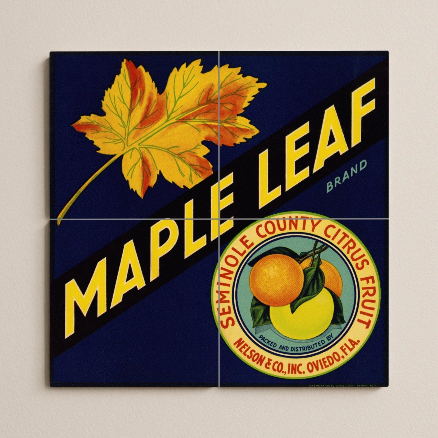 Tile mural with maple and citrus leaves – Vintage Florida fruit crate label – Retro American kitchen decor – Ceramic panel with bold typography