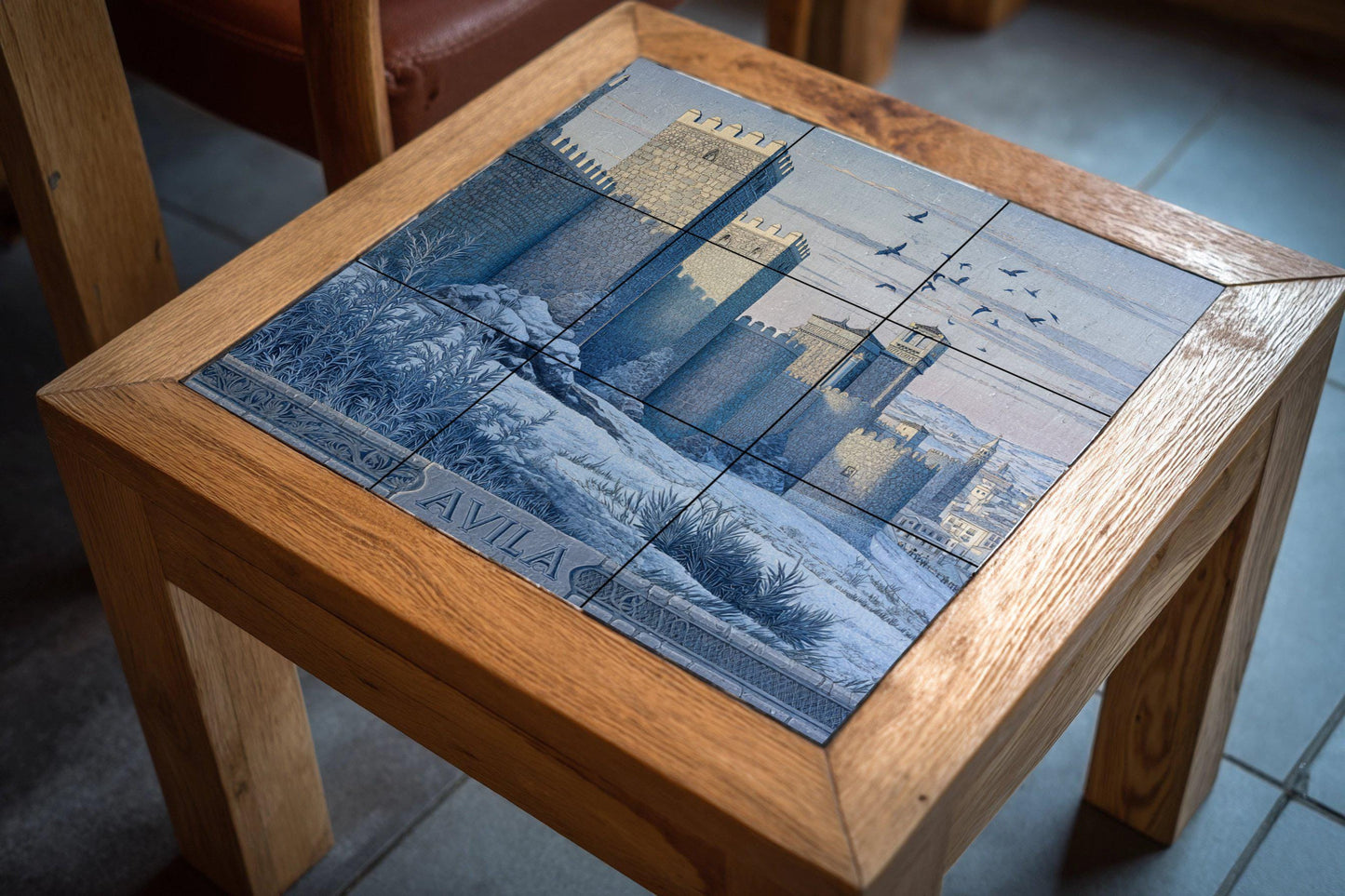 Tile mural from Ávila: Scene of a medieval Spanish fortress. Monochromatic heritage ceramic. Castilian urban panel for historic interiors.