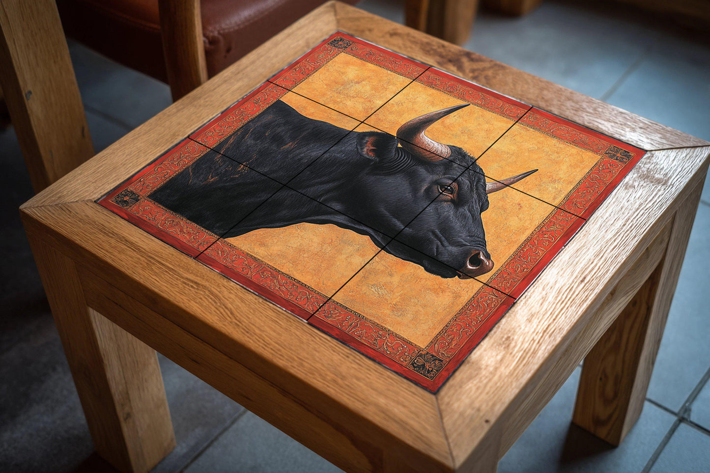 Ceramic mural from Las Ventas, Madrid: Portrait of a black bull with ornate red frame and gold background, Spanish heritage art tile