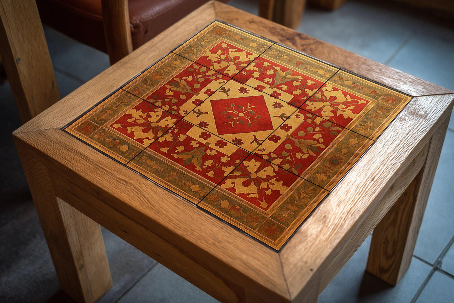 Armenian ceramic mural with motifs of crosses, golden rosettes, red geometric centerpiece and ornamentation of illuminated vines.