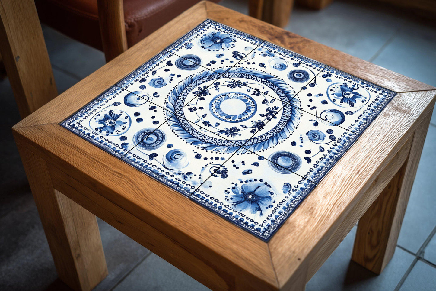 Blue ceramic mural: Bohemian floral spirals and dotted motifs, Modrotisk-inspired design with elegant lace border.