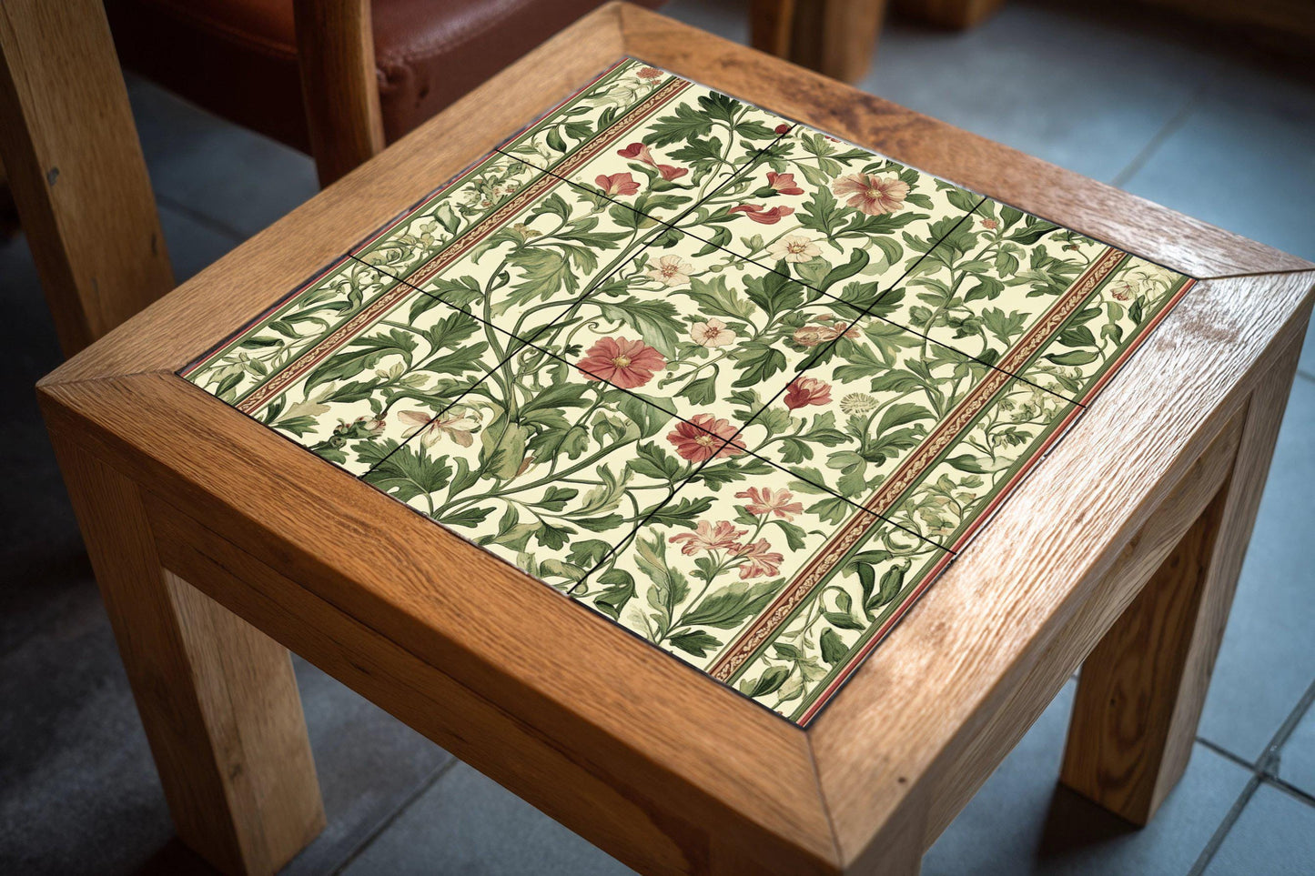 Arts and Crafts ceramic mural: floral tile artwork inspired by William Morris with green foliage, red flowers and classic, elegant decoration.