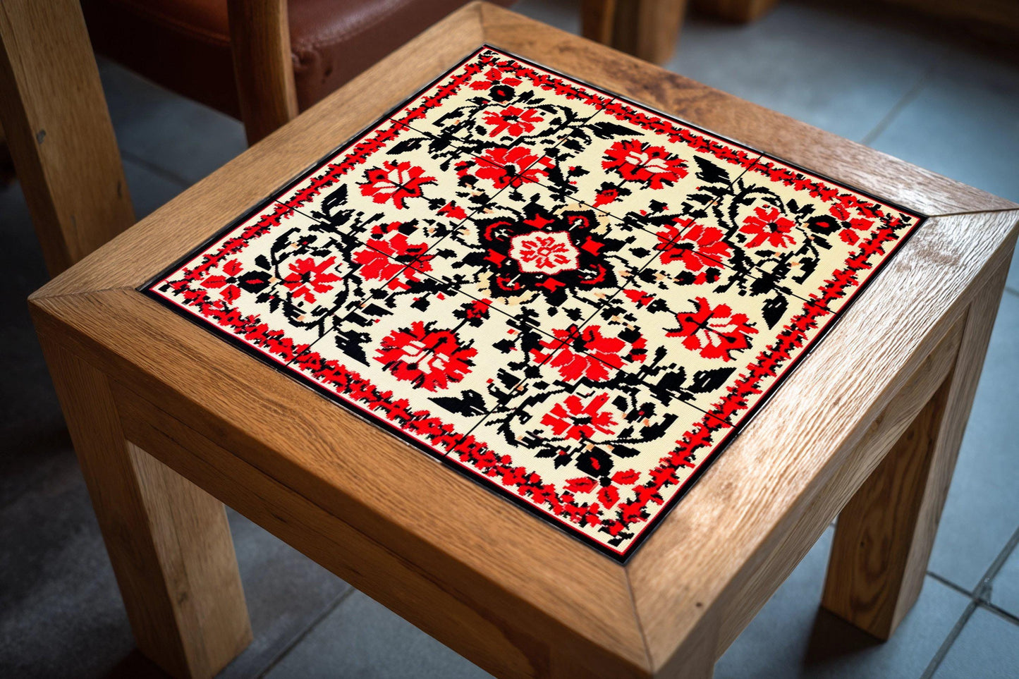 Bulgarian folk ceramic mural: symmetrical floral motifs in red and black with traditional geometric elegance, decorative tile wall art.