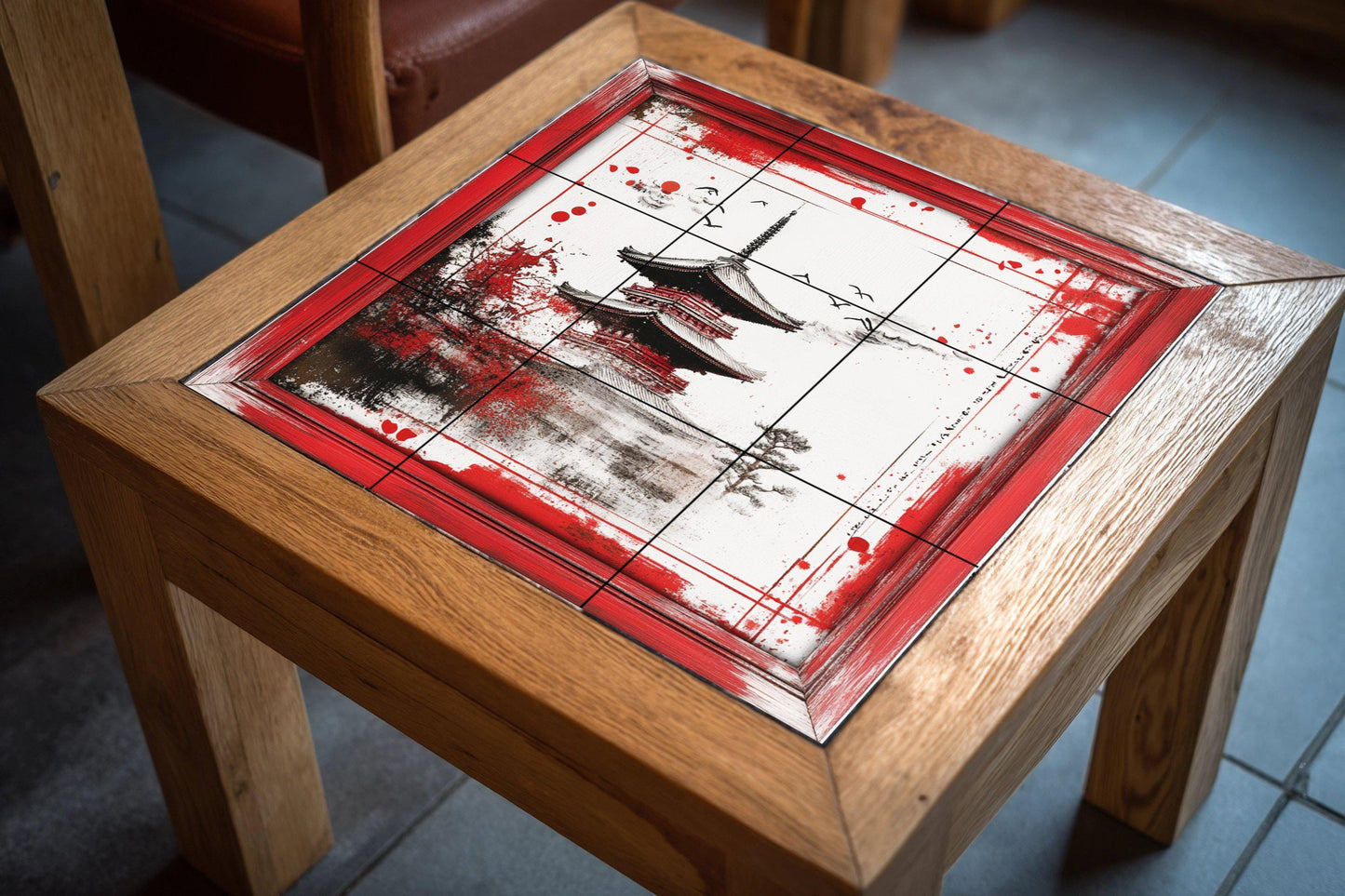 Japanese pagoda ceramic mural: artwork on red and black ink tiles with brushstroke borders and an elegant Zen landscape.