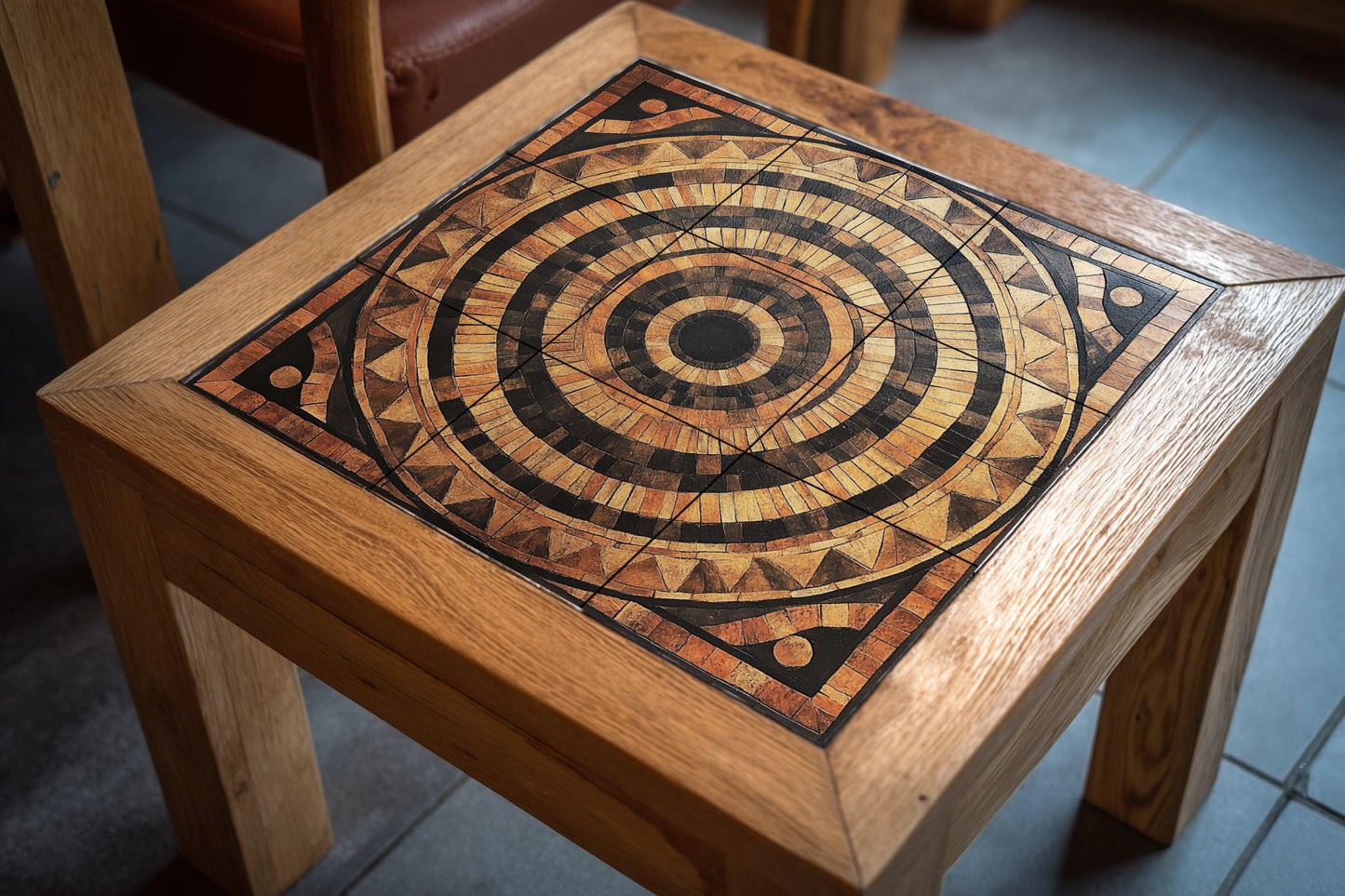 Circular ceramic mural in wood style: earthy concentric tile art, tribal-inspired wall panel, rustic design with decorative pattern.