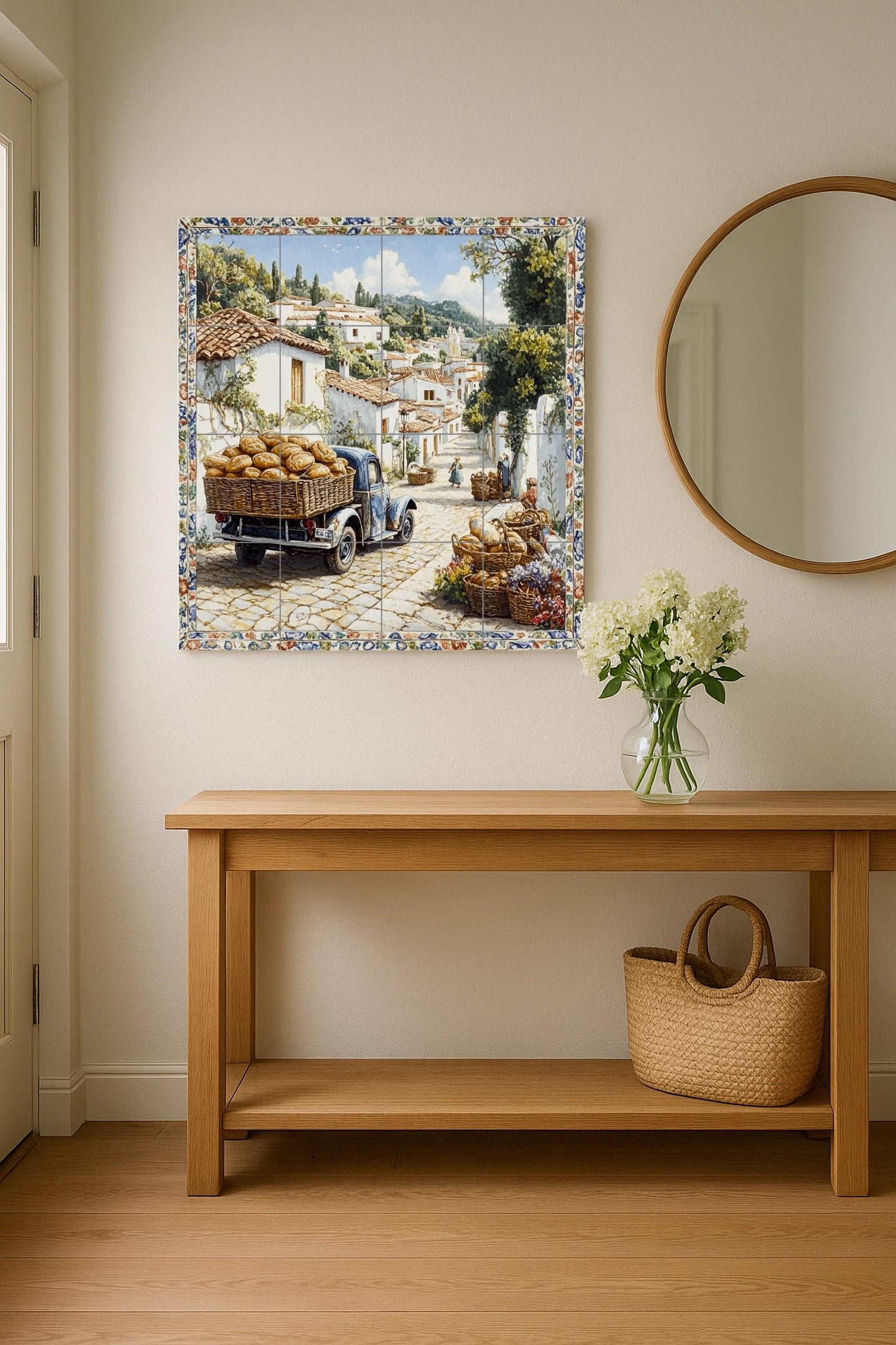Ceramic mural of a village in southern Italy: a rustic bread cart on a sunny street with whitewashed houses and cobbled paths.