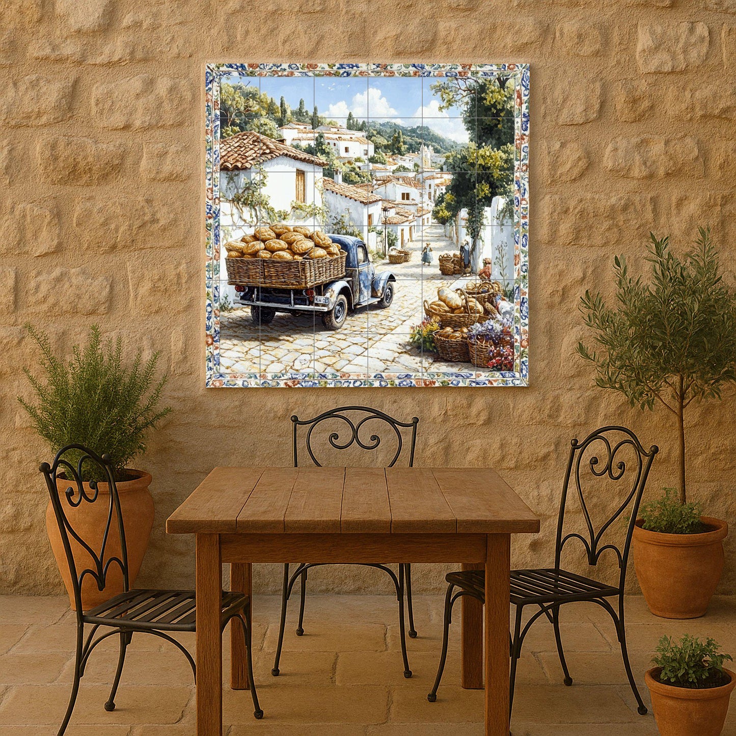 Ceramic mural of a village in southern Italy: a rustic bread cart on a sunny street with whitewashed houses and cobbled paths.