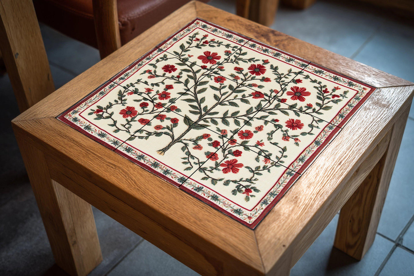 Embroidered ceramic mural of Bethlehem: Palestinian Tatreez Tree of Life with red flowers from Gaza and folk heritage pattern from Jerusalem.