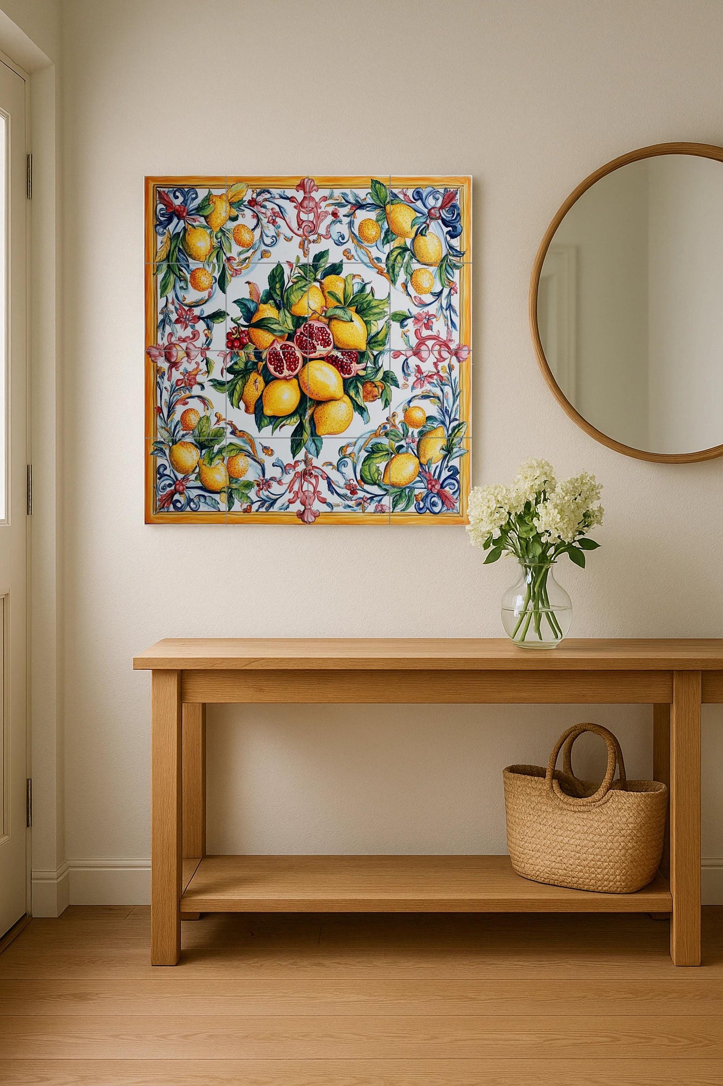 Sicilian majolica mural: lemons and pomegranates in vibrant Mediterranean colors, bordered with rococo spirals on glazed ceramic tiles.
