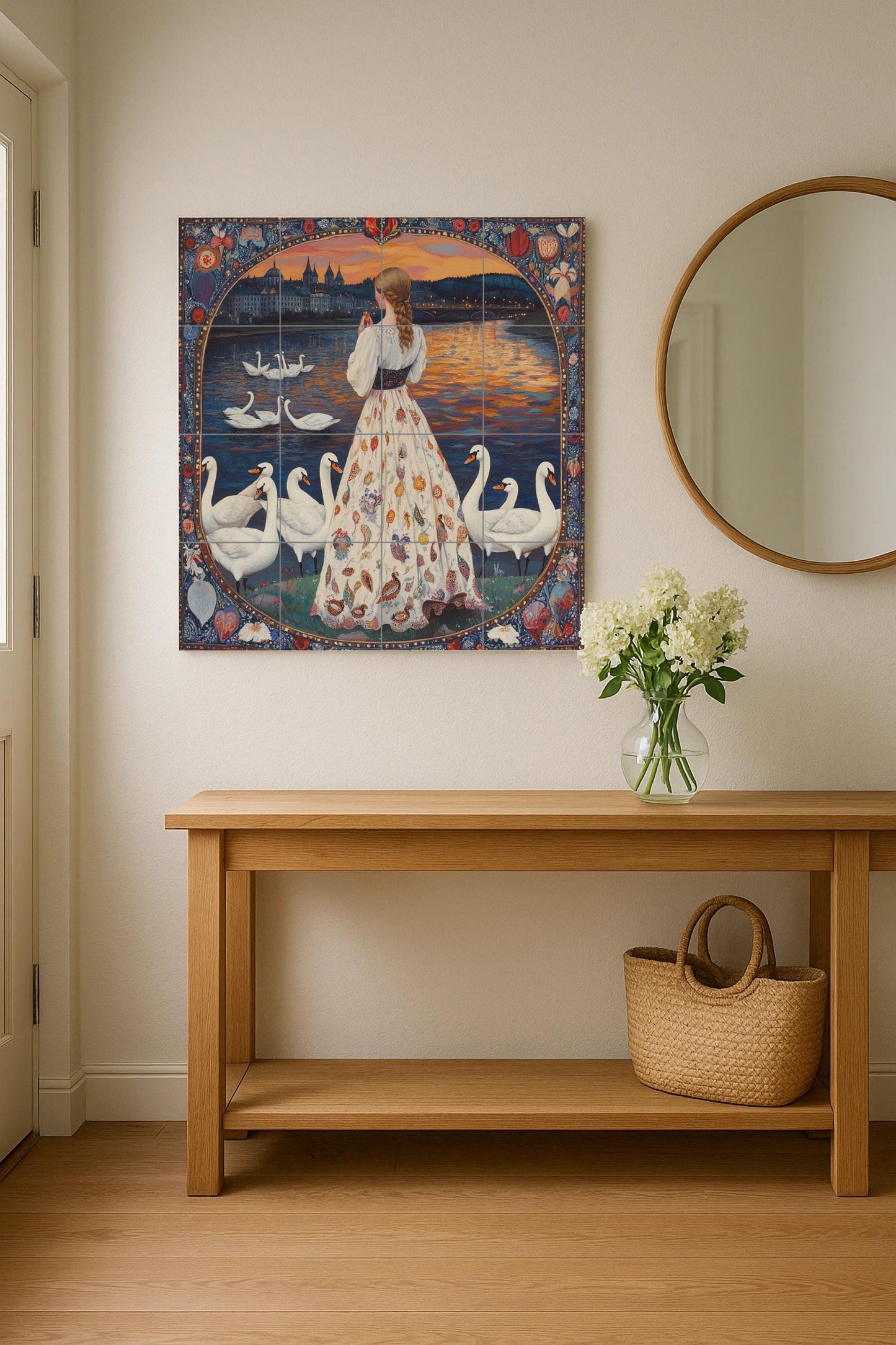 Folk ceramic mural: swans on a lake at sunset with a woman in a floral dress, fairy tale border and narrative wall art.