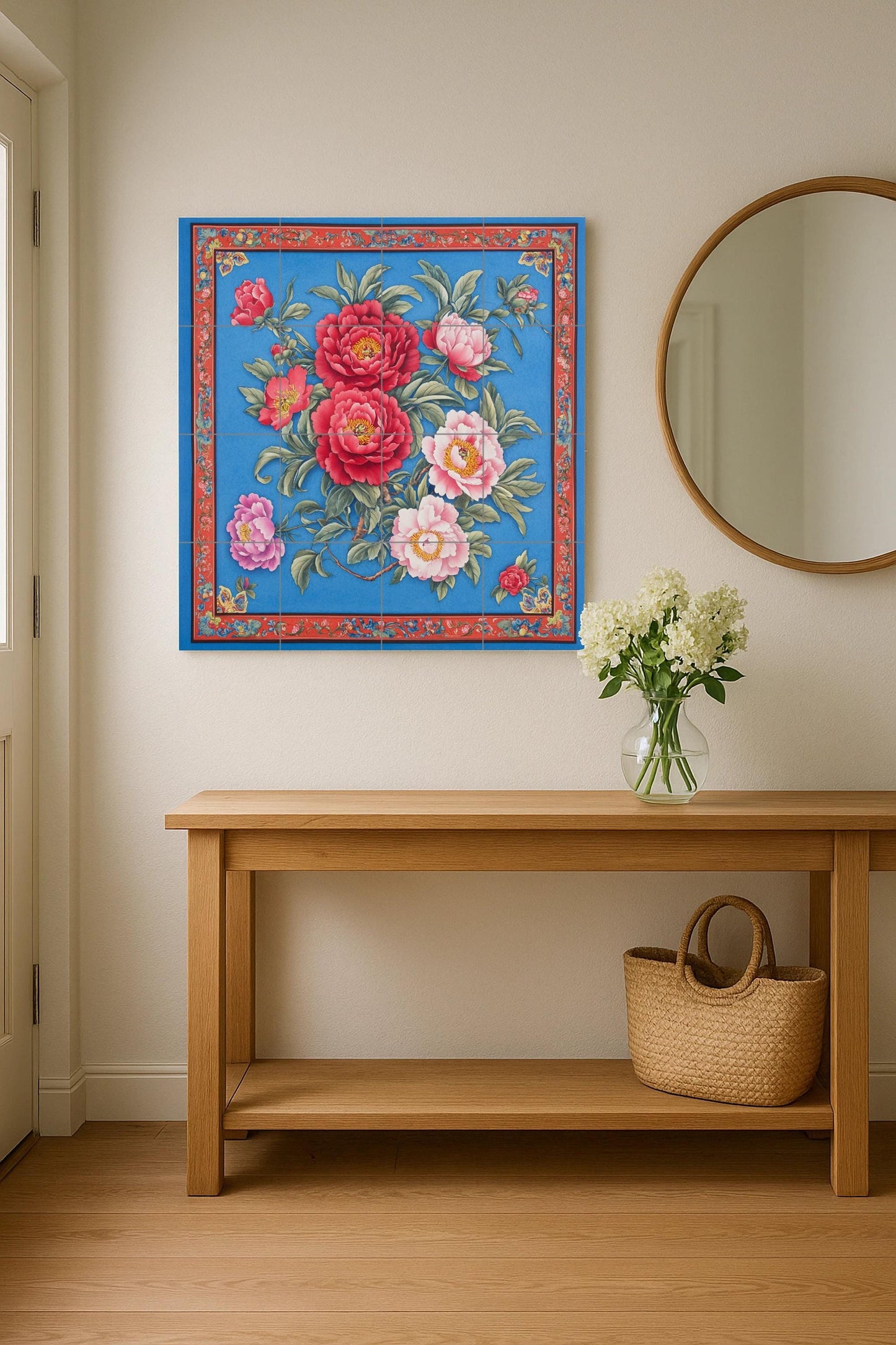 Large ceramic floral mural: intense red and pink flowers on a deep blue with an ornate border, striking tile wall art for impactful interiors.