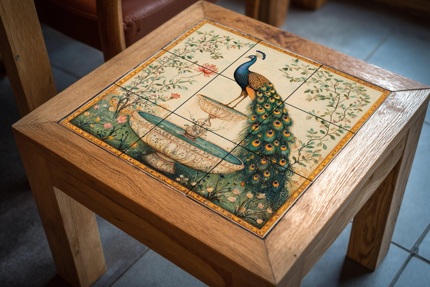 Ceramic mural with Indian peacock fountain: majestic bird among lotus flowers and garden vines, handcrafted design with golden details.