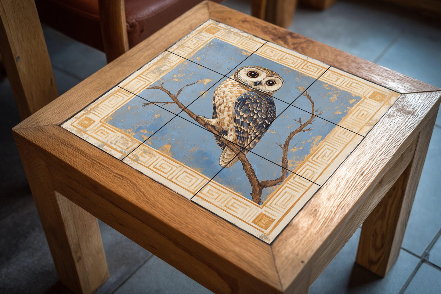 Athenian owl ceramic mural: classic blue and gold motif with perched owl and Greek geometric frame, timeless handcrafted design.