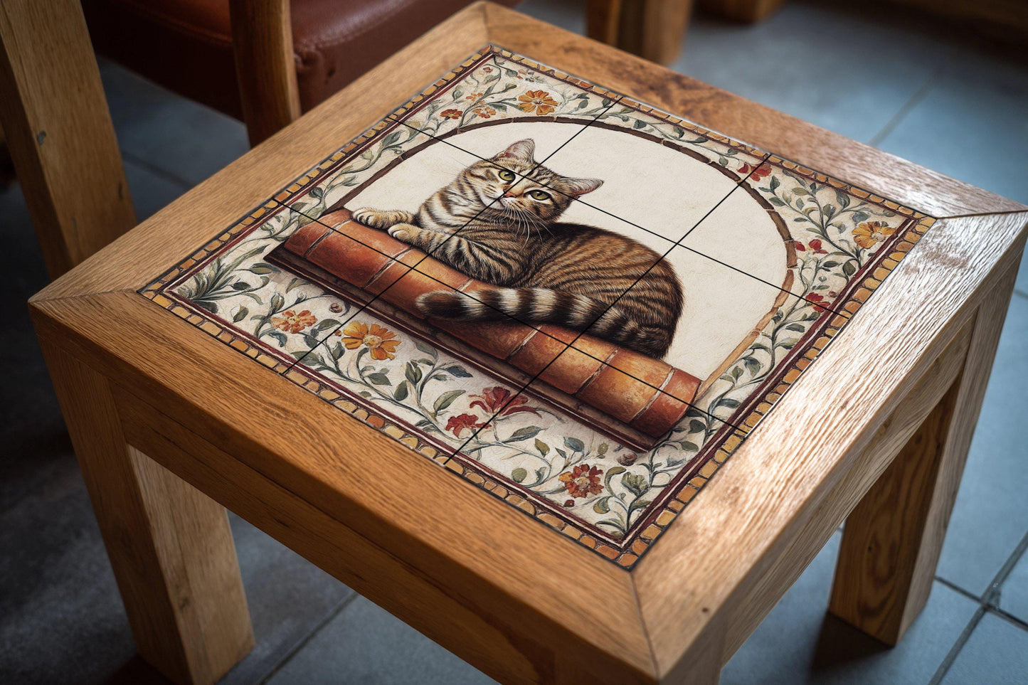 Ceramic mural of a tabby cat: Feline resting on a terracotta shelf with a floral arch, vintage charm and warm artistic details.
