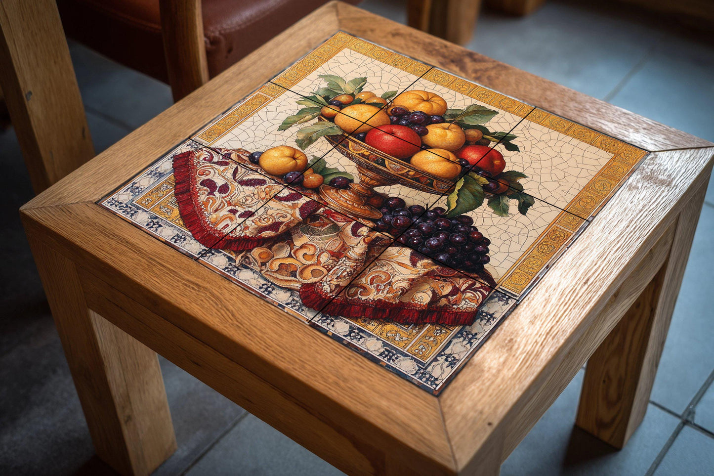 Ceramic still life mural: Baroque composition of fruits with golden details: grapes, apples and oranges on ornamental fabric.