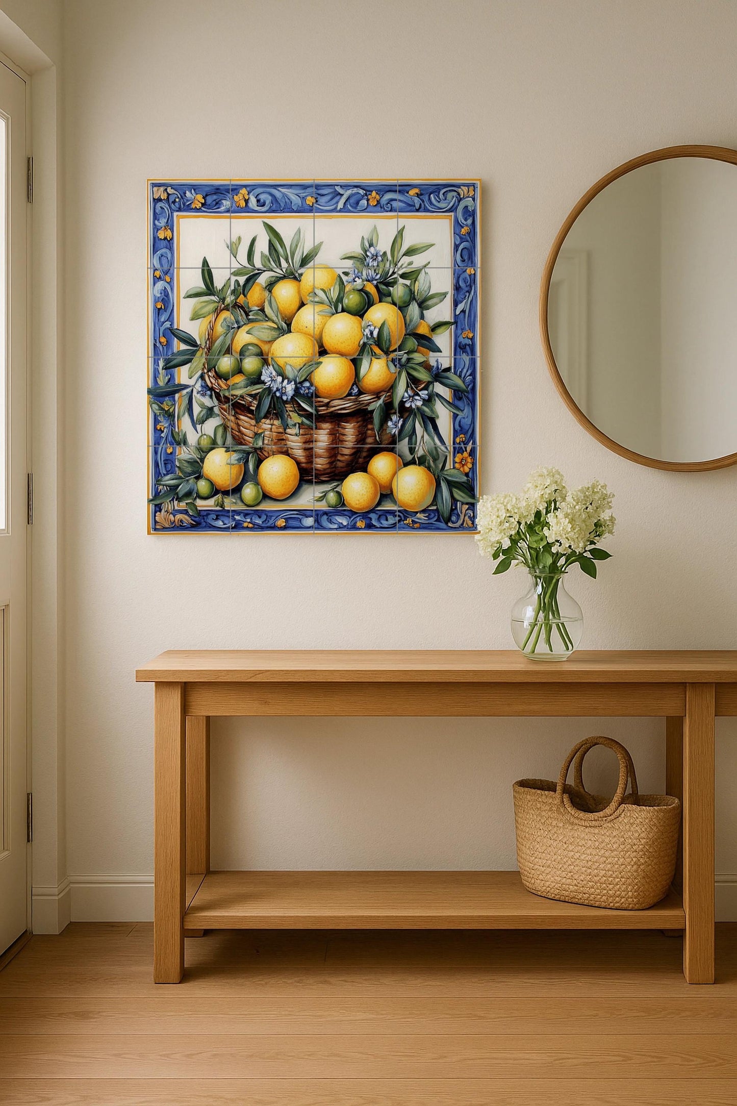 Ceramic mural with basket of lemons and oranges: blue floral border, Mediterranean citrus tile artwork with green leaves and flowers.