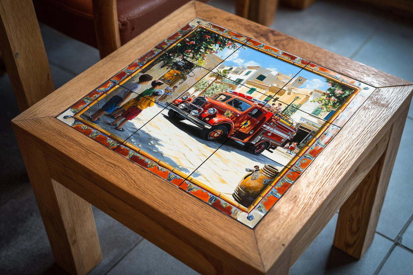 Ceramic mural with an old fire truck in a Mediterranean village: decorative artwork with colorful tiles, children and a sunny street.