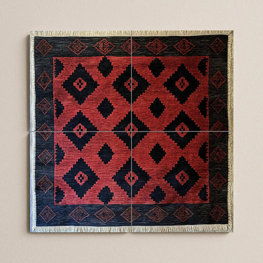 Argentine gaucho poncho ceramic mural with red and black diamond motifs and border pattern inspired by pampa weaving