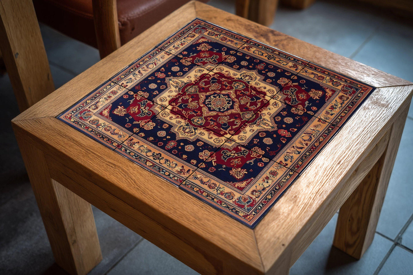 Shiraz Persian ceramic mural with a rich floral medallion and decorative tiles in red and navy blue, wall art inspired by traditional carpets.