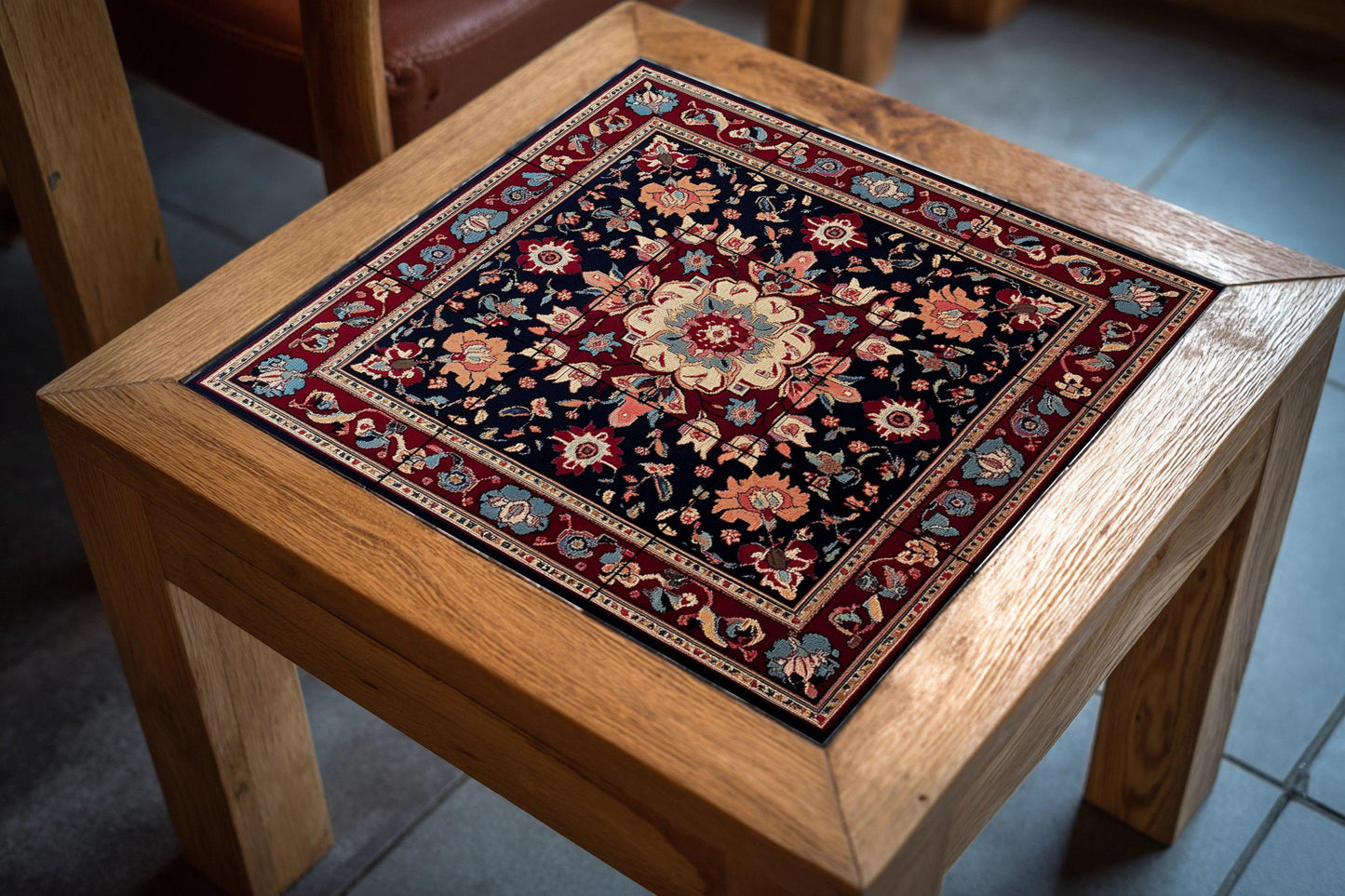 Lebanese ceramic mural from Beirut with a floral medallion and tiles in indigo and crimson tones. Decorative art of oriental inspiration.