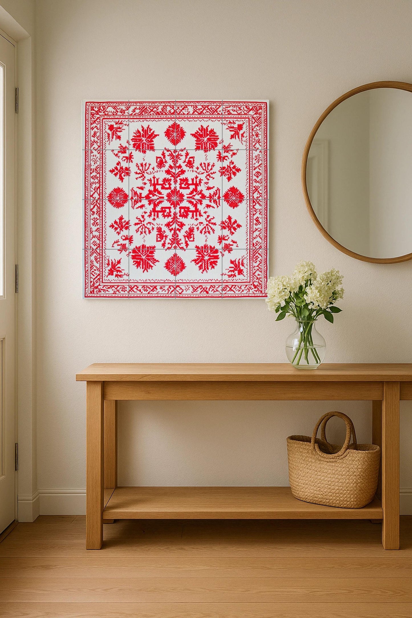 Ceramic mural: design inspired by red geometric embroidery, traditional urban motifs with ornamental borders on white tiles.