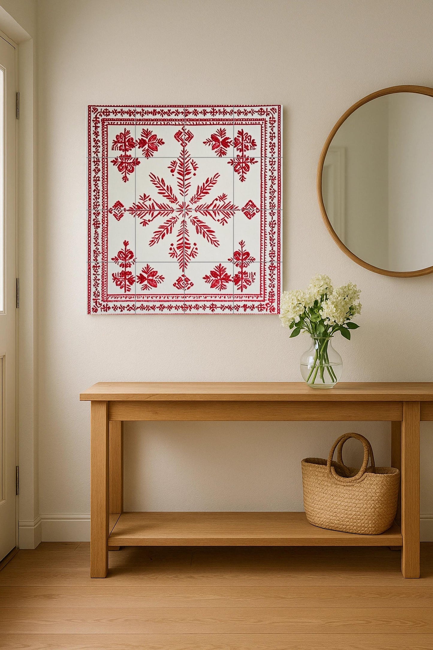 Ceramic mural: design inspired by the Belarusian Vyshyvanka, with red embroidered motifs and a popular geometric pattern on white tiles.