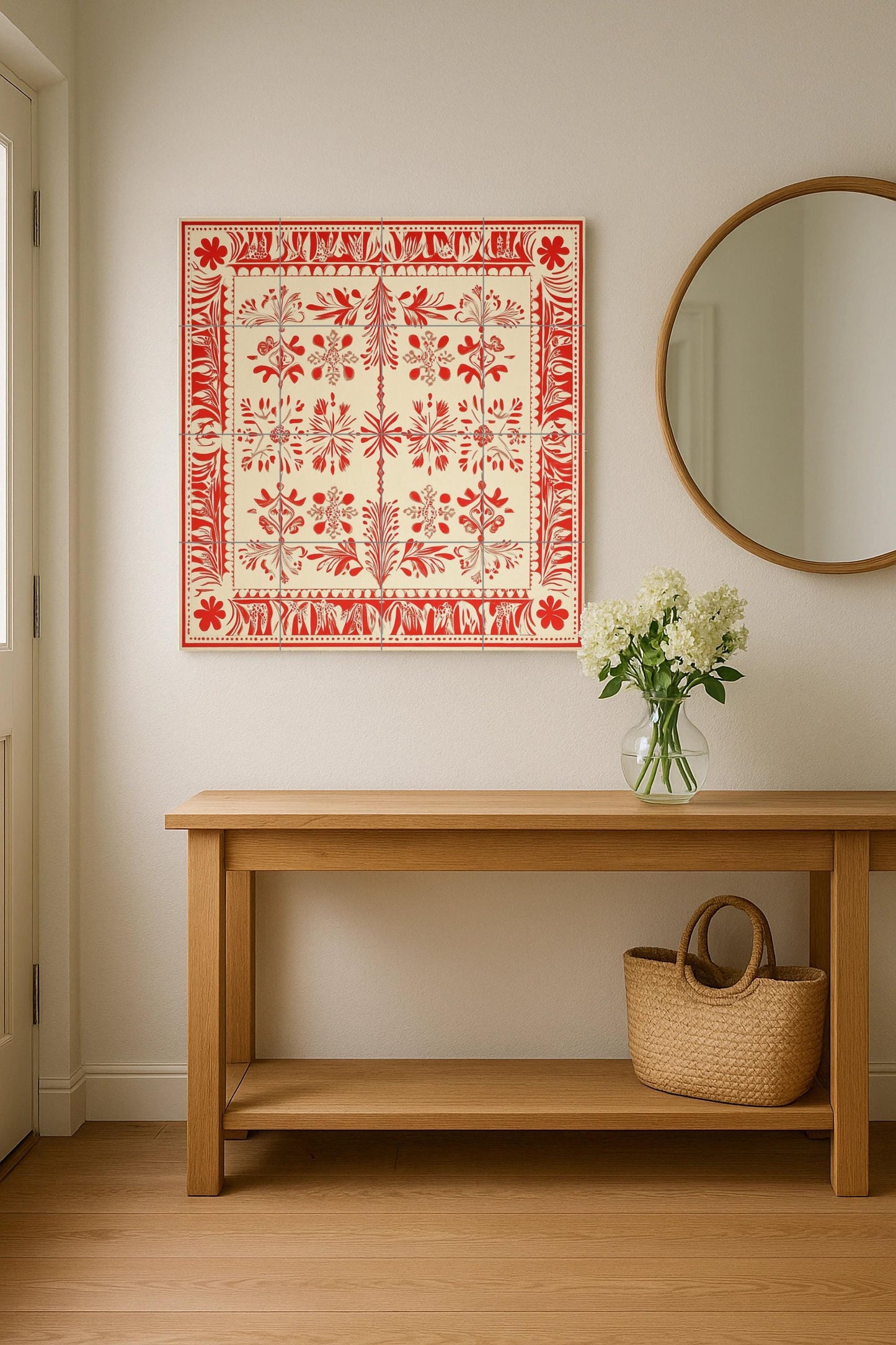 Red and white ceramic mural: Baltic folk-inspired tile artwork with Latvian Lielvārde sash motifs and ornamental textile borders.