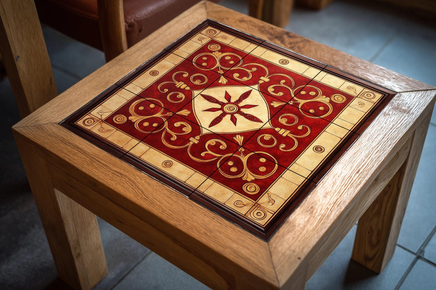 Red and gold ornamental ceramic mural: intricate spiral work, majestic geometric center, elegant decorative tile artwork.