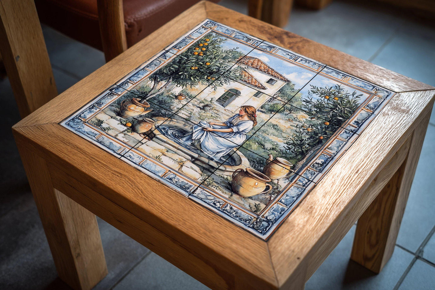 Mediterranean patio ceramic mural: rustic mosaic with woman at a fountain, orange trees, earthenware jars, farmhouse and pastoral style tiles.