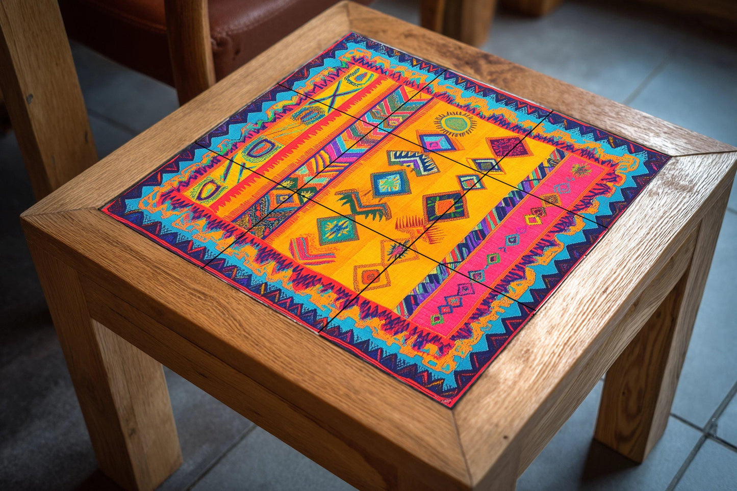 Wayuu ceramic textile mural: vibrant mosaic with tribal symbols, geometric zigzags, a border inspired by backpacks and colorful handcrafted tiles.