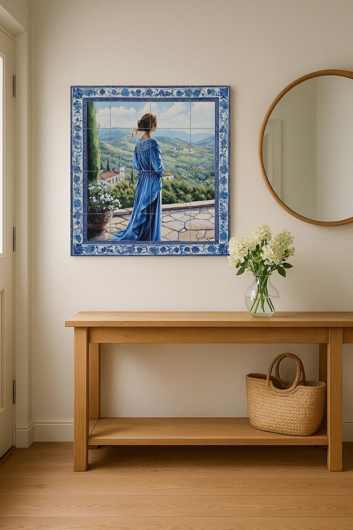 Ceramic mural "The Blue Lady": elegant mosaic with a woman in a flowing dress, terrace view, rolling hills, ornamental floral border and scenic tiles.
