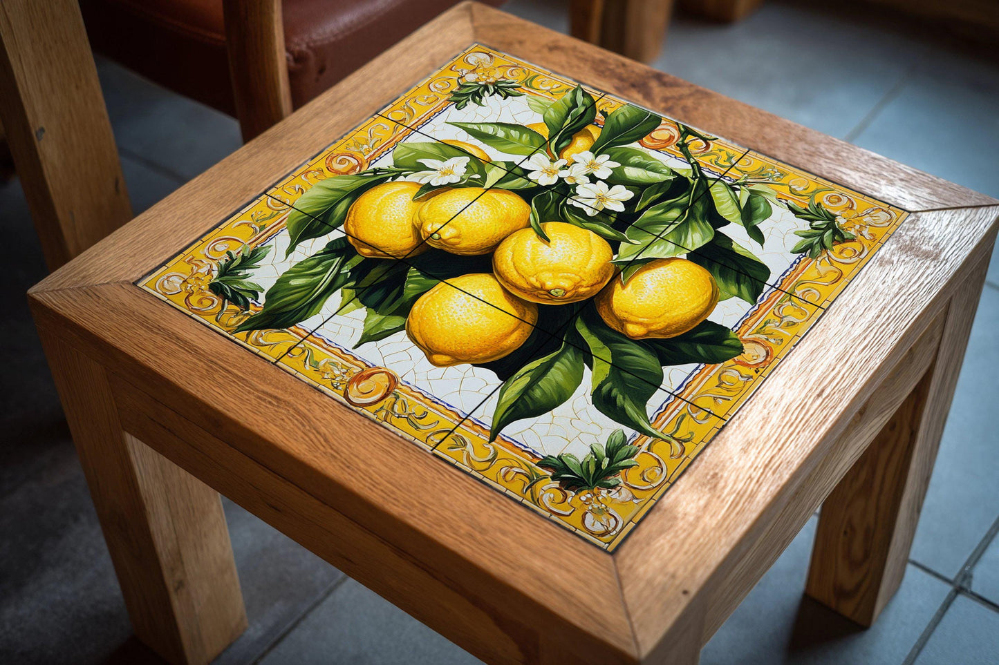 Ceramic tile mural with lemons, citrus blossoms, green leaves and a decorative wall art panel with fruit and ornate yellow border.
