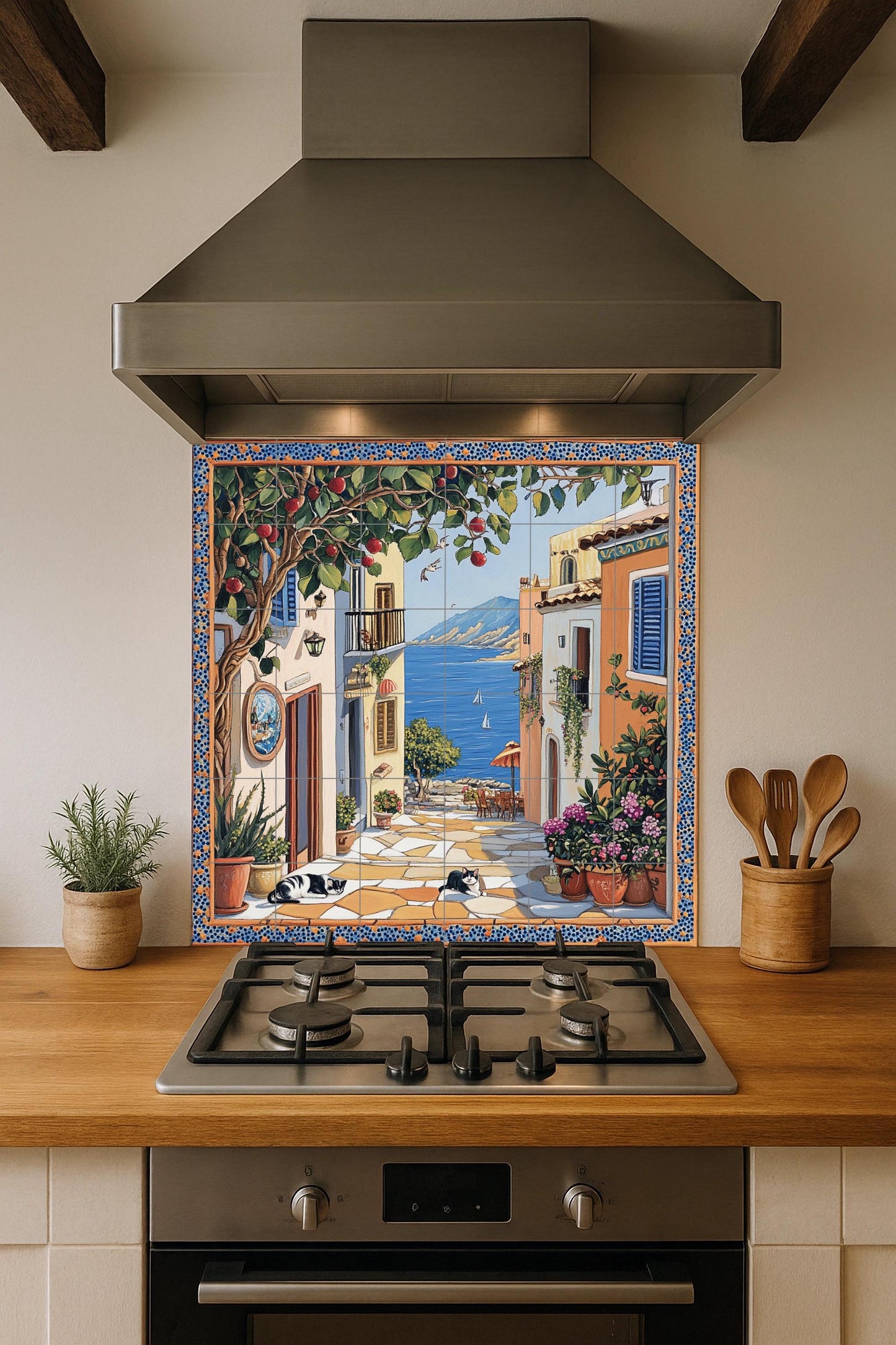 Ceramic tile mural with street scene of a coastal town, fruit tree, flower pots, houses by the sea and black and white cats resting on the pavement.