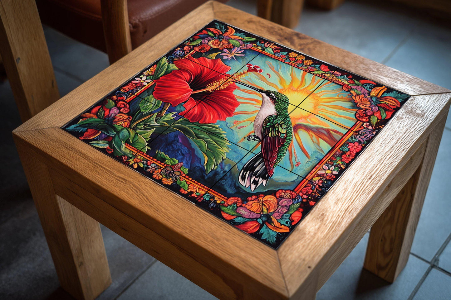 Caribbean hummingbird ceramic wall mural with hibiscus flower, radiant sun and lush floral frame, tropical island inspired tile panel.
