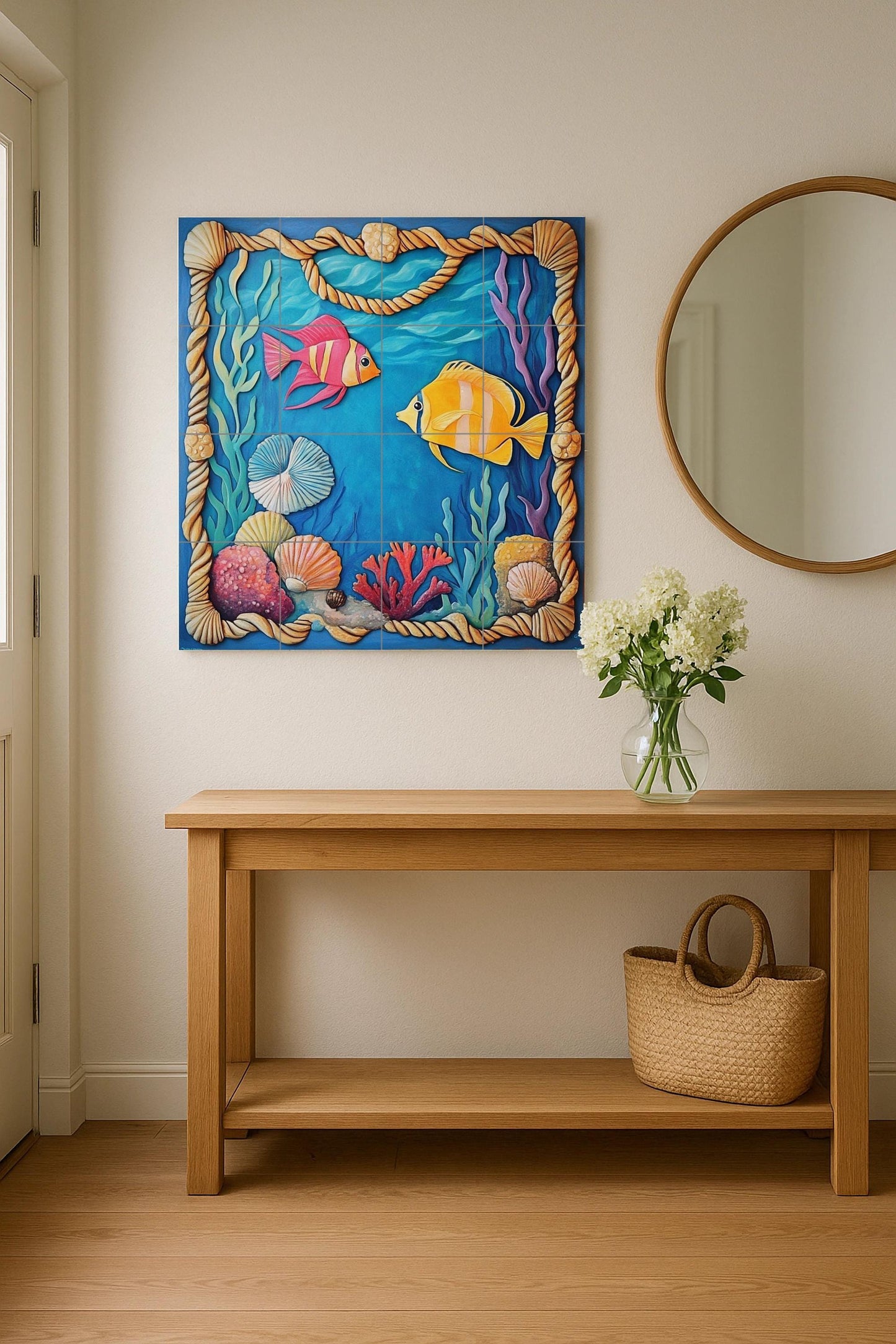 Underwater tile mural with colorful fish, shells, and a coral frame. Handmade coastal art for kitchen and patio.