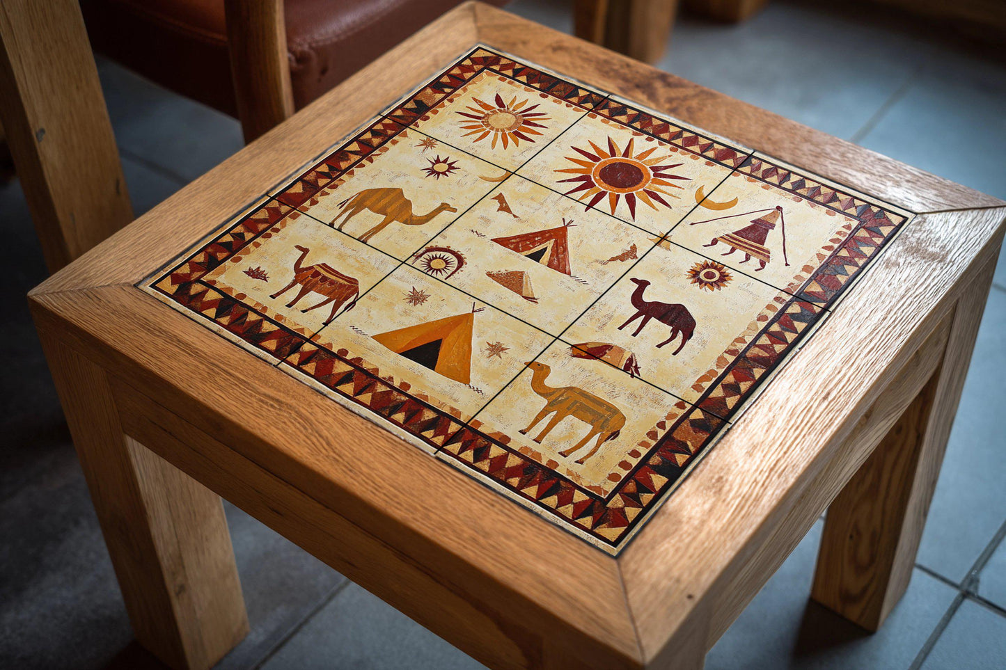Ceramic mural of the Mauritanian desert: Mosaic art with Berber symbols, camels, suns and nomadic tents, wall panel inspired by the Sahara sand.