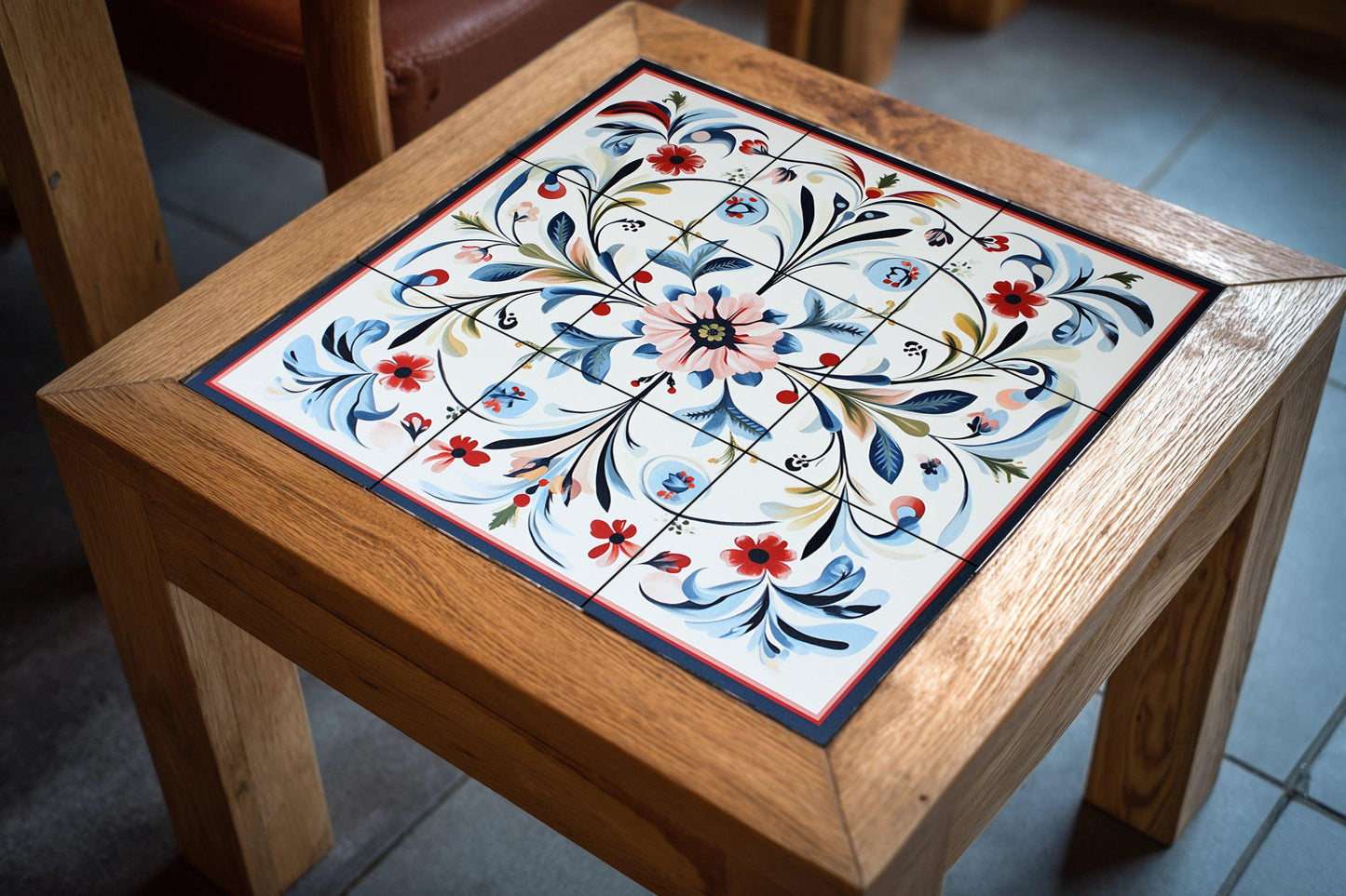 Norwegian ceramic mural Rosemaling: Nordic folk floral design in blue and red with stylized Scandinavian border.
