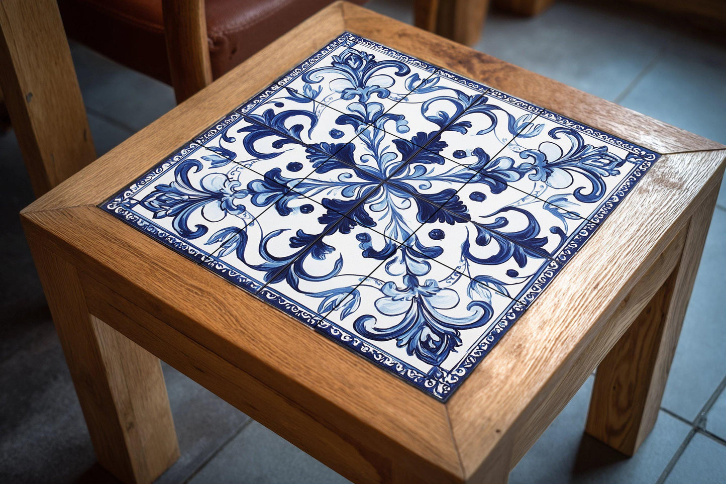 Portuguese tile ceramic mural: classic blue and white floral ornament with filigree border, elegant decorative design.