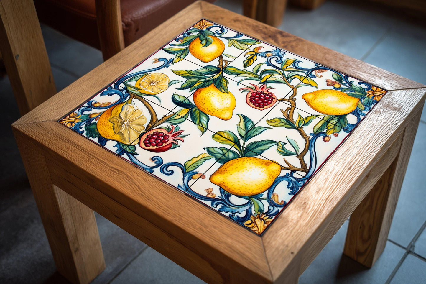 Valencian ceramic mural: lemons and pomegranates with blue scrolls, inspired by the Mediterranean orchards and the ceramic heritage of Manises.
