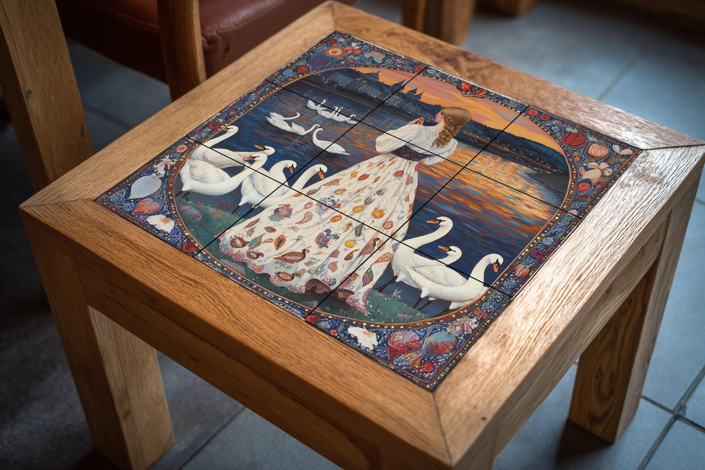 Folk ceramic mural: swans on a lake at sunset with a woman in a floral dress, fairy tale border and narrative wall art.