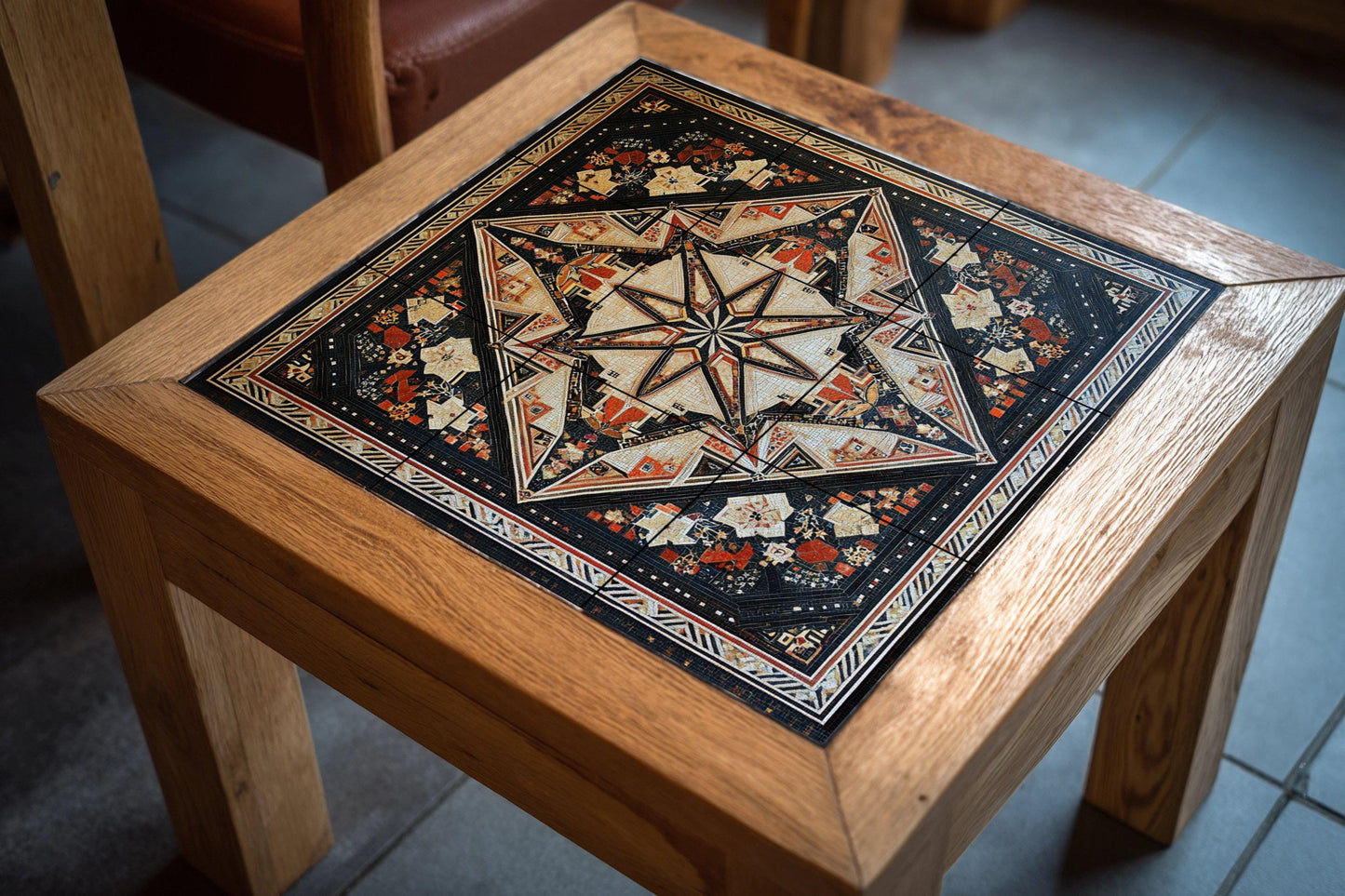 Geometric ceramic mural from the Middle East: modern star mosaic in black, ivory and terracotta, ornamental wall art with timeless symmetry.