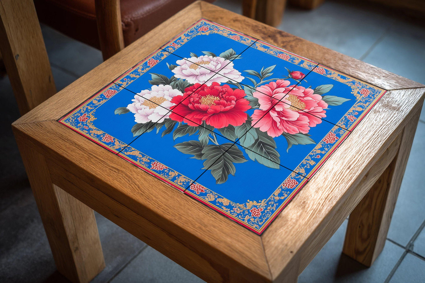 Taiwanese Hakka ceramic mural: vibrant peony flowers on a cobalt blue folk art floral tile panel with festive gift fabric border.
