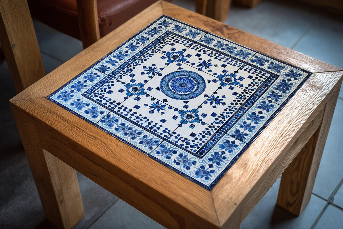 North African ceramic mural: Fez, Tunis, Marrakech, Algiers, Chefchaouen, blue and white tile art with floral and geometric motifs.
