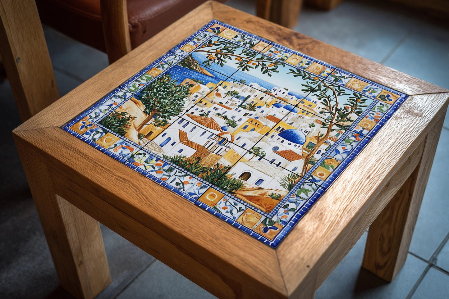 Symi ceramic mural: mosaic of a Mediterranean village with blue domes, sea horizon, olive trees, citrus border and coastal architecture tiles.