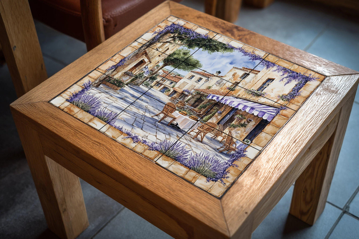 French rustic cafe ceramic wall mural with wicker chairs, lavender garlands and Provencal decorative tile panel of golden stone village square.