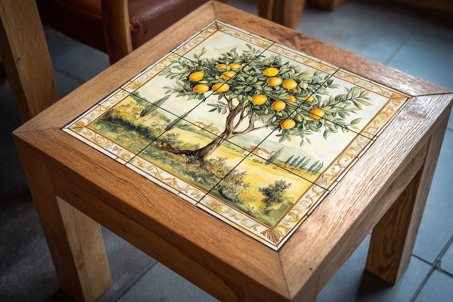 Ceramic wall mural of a lemon tree with a Tuscan landscape and gold border, Mediterranean orchard tile art, handmade rustic kitchen decor