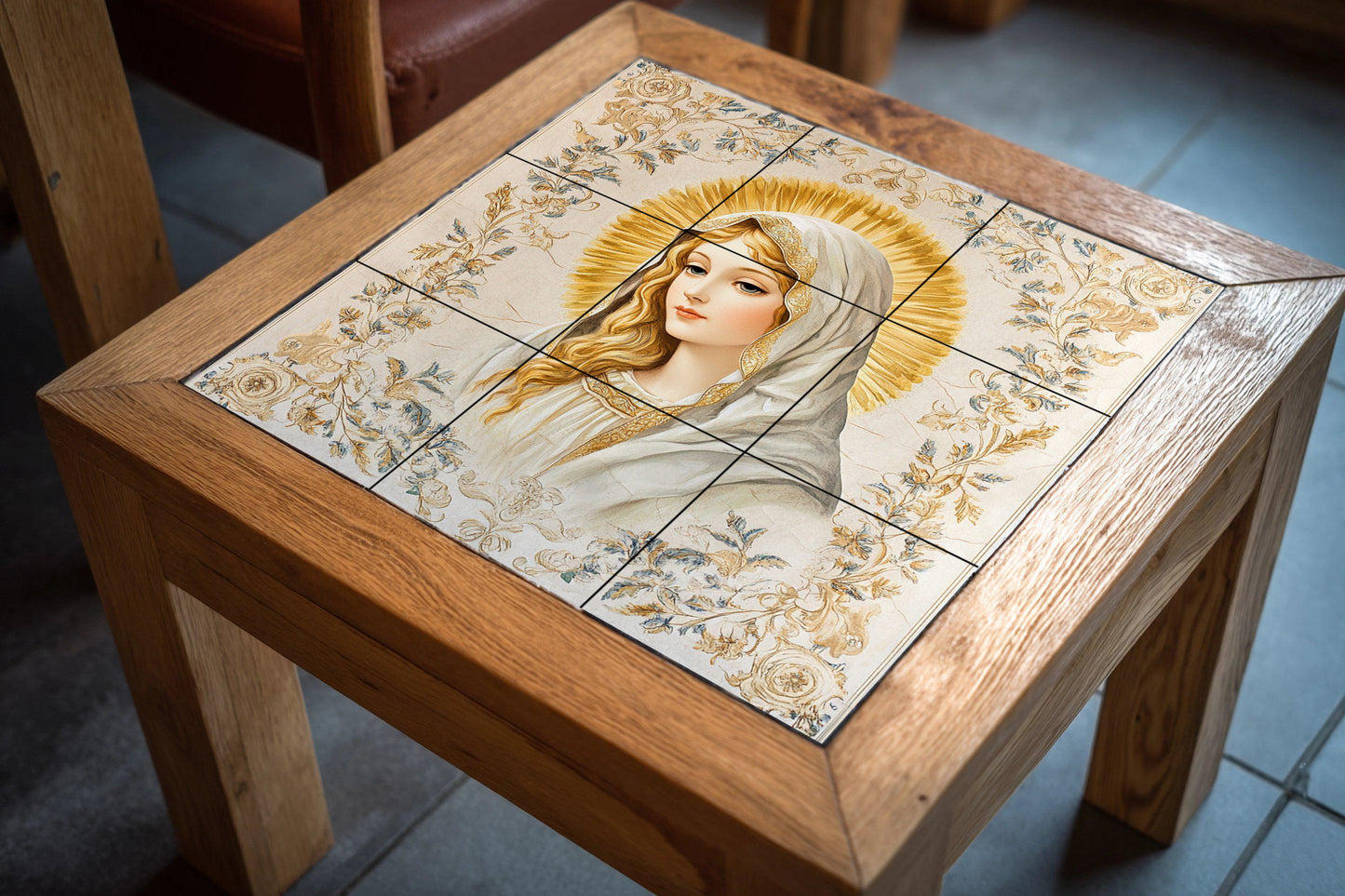 Ceramic wall mural of the Virgin Mary with a golden halo and floral ornaments, sacred religious tile art, handmade Catholic spiritual decoration
