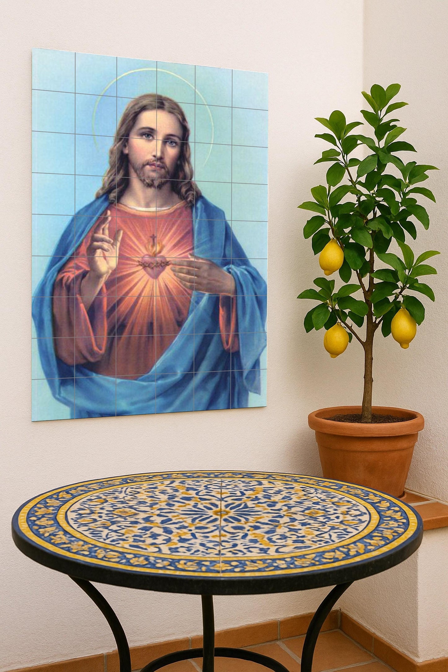 Ceramic mural of the Sacred Heart of Christ: luminous devotional art in classic blue and red tones, a spiritual and serene wall piece, a sacred representation.