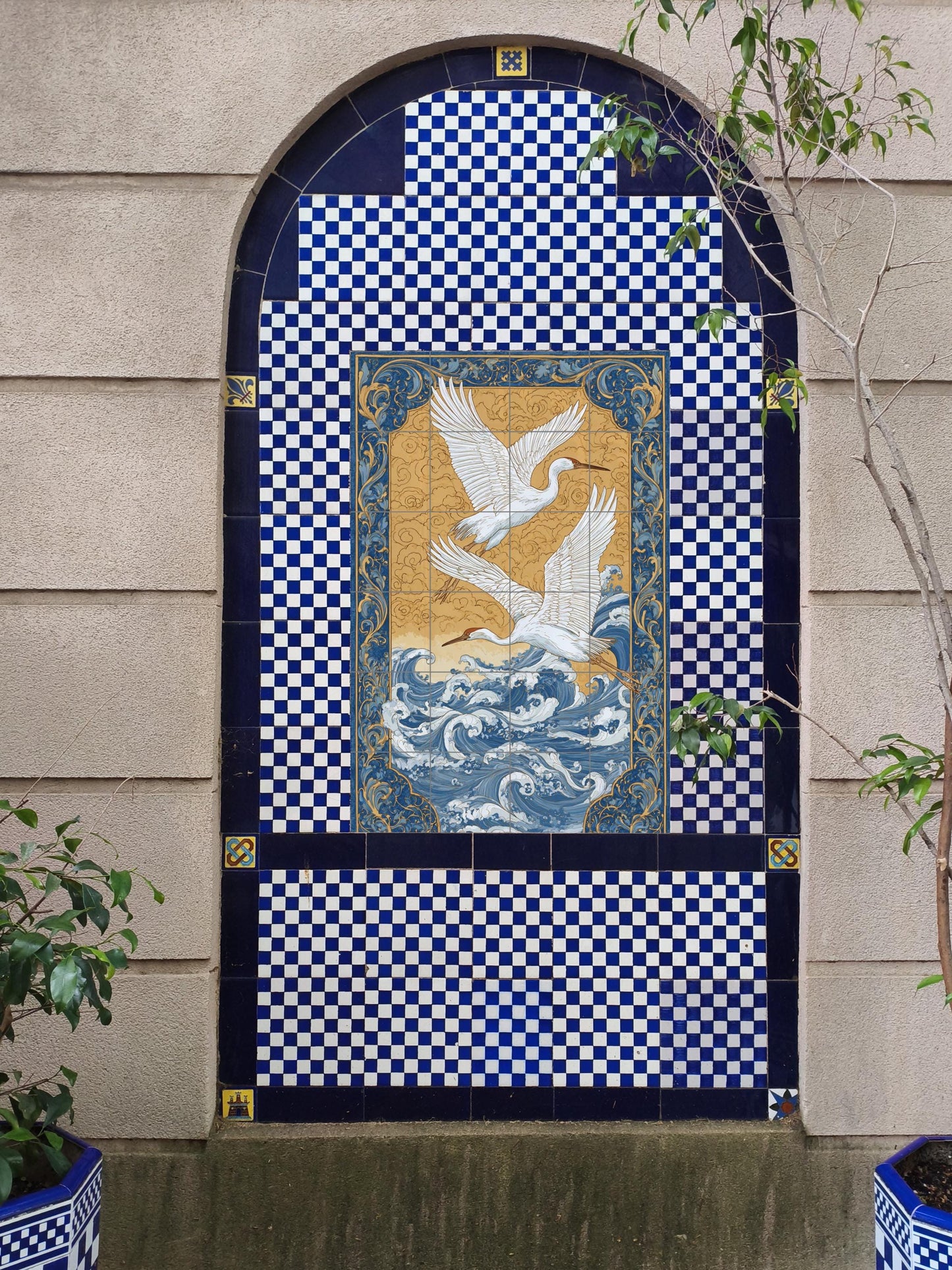 Wings over the Aegean – Ceramic mural with ornamental ocean waves and golden sky, symbolist tile work with cranes in flight